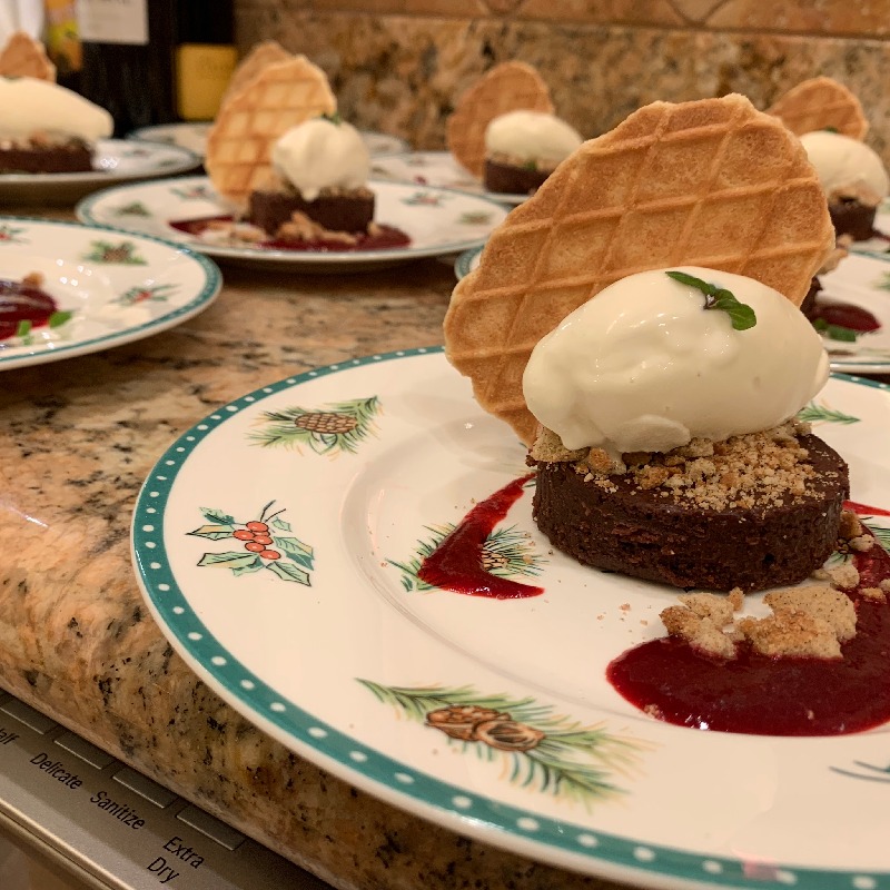 flourless chocolate torte with raspberry and ice cream 