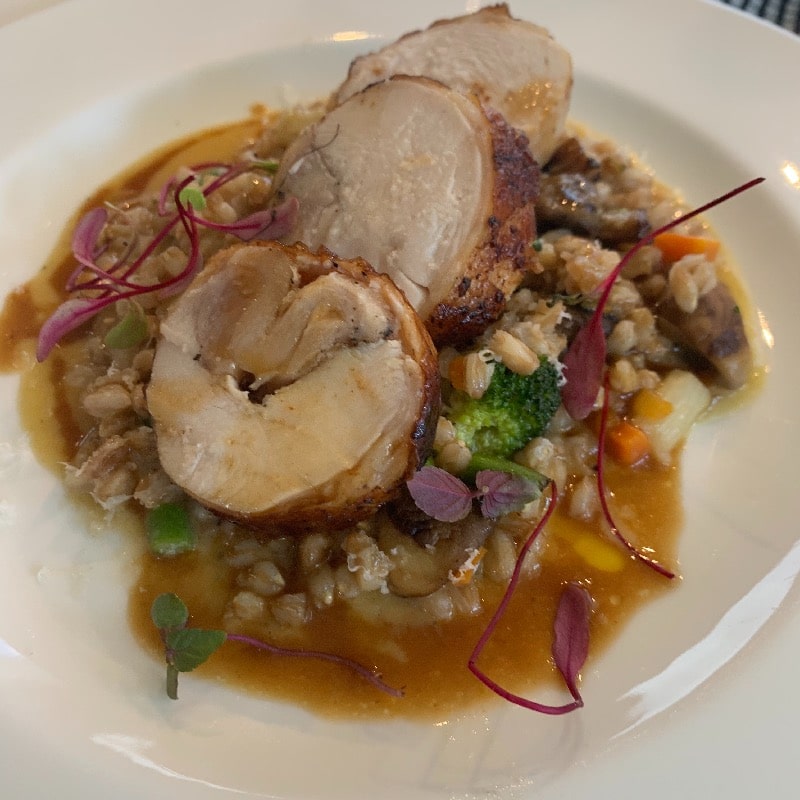 chicken ballotine with farro risotto and roasted vegetables 