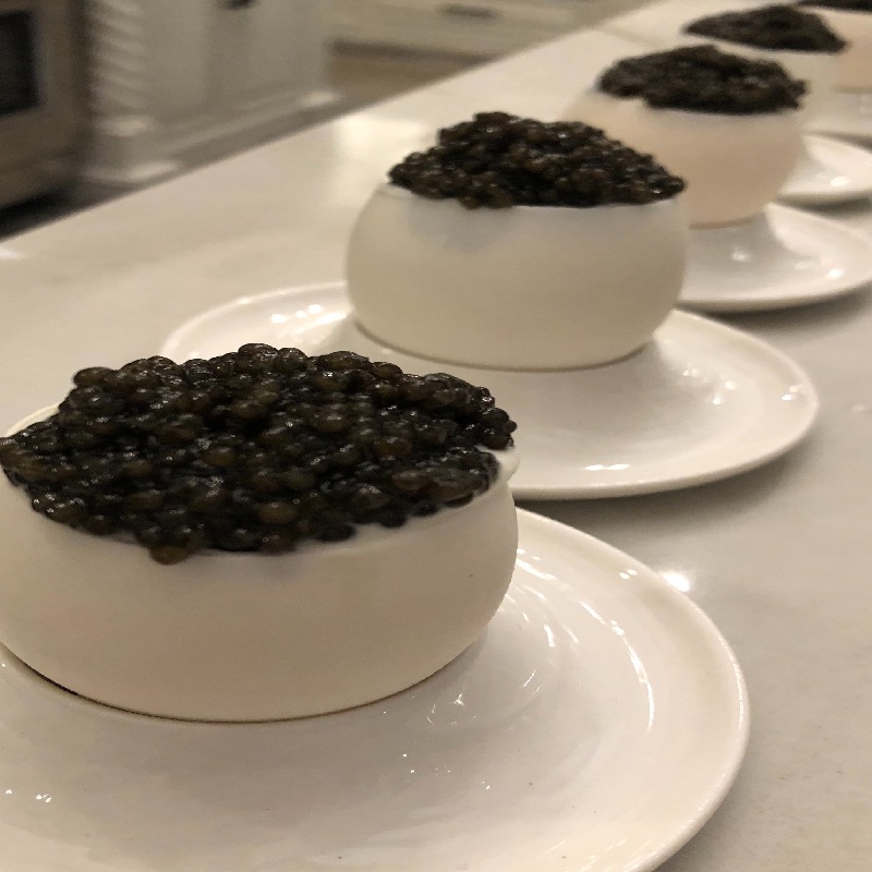 Vodka cream sauce egg with black caviar