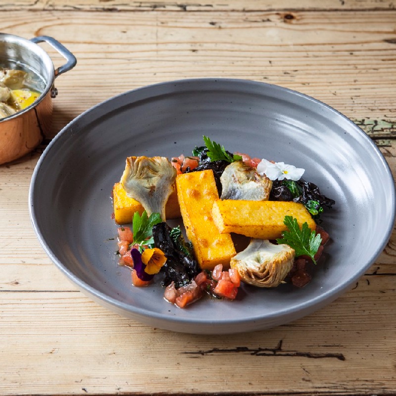 Polenta chips with baby artichokes and sauce vierge