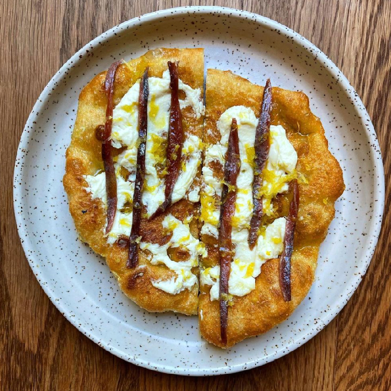 Homemade yoghurt bread, anchovies, labneh, lemon zest 