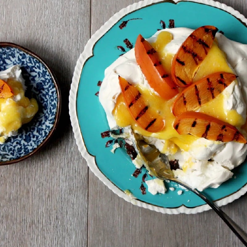 Meringue with yuzu curd and griddled persimmon