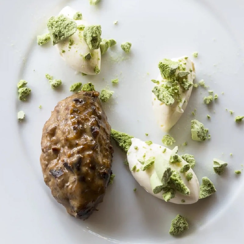 Green tea meringue with tipsy prune ganache