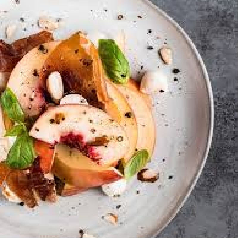 peach and prosciutto and almond salad